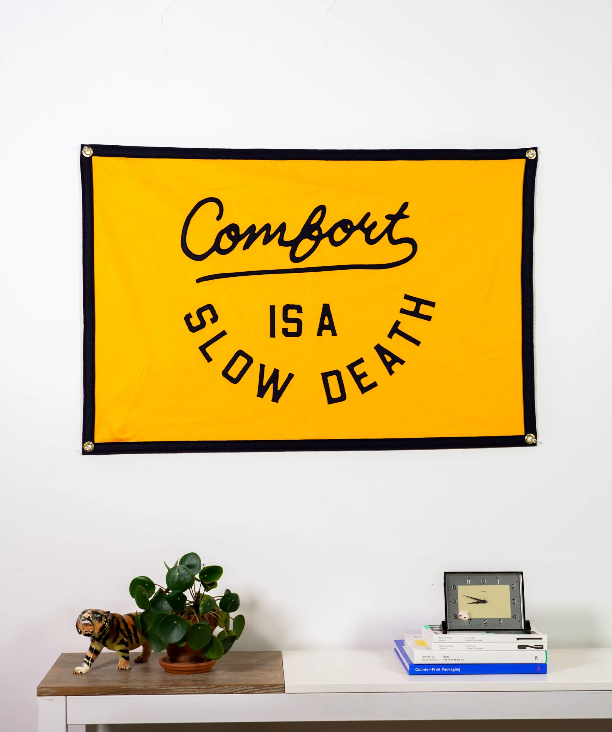 Comfort is a Slow Death Championship Banner
